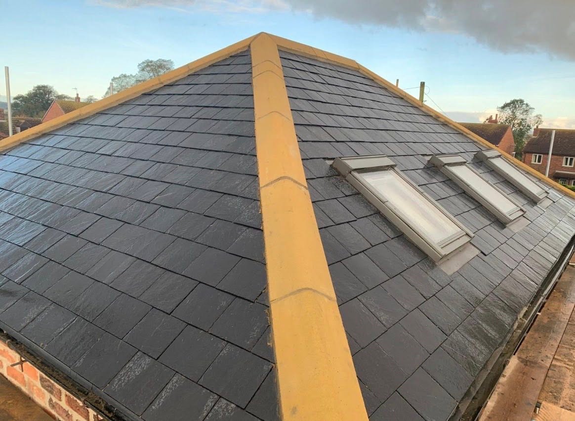 New slate roof with Velux windows by Kass Roofing